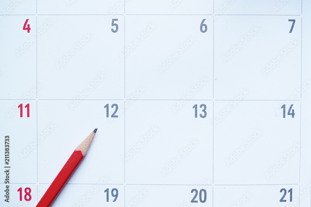 close up of organizer or calendar and red pencil, planning for business meeting or travel planning concept close up of organizer or calendar and red pencil, planning for business meeting or travel planning concept