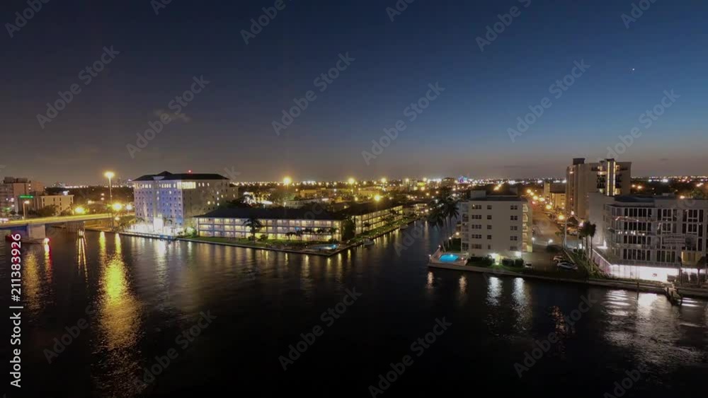 Time lapse video of waterway from hotel room balcony in Fort Lauderdale, Florida at night time. Awesome view of several passing boats and airplane light trails. Time lapse video of waterway from hotel room balcony in Fort Lauderdale, Florida at night time. Awesome view of several passing boats and airplane light trails.