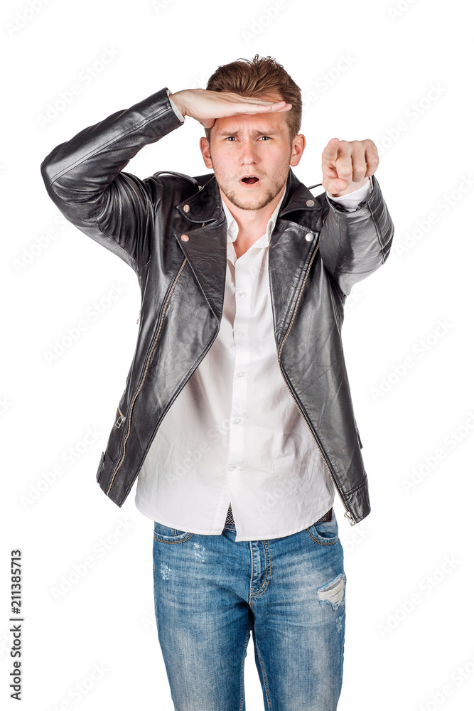 portrait of young man in black eather jacket isolated on a white background. Emotion and people concept.