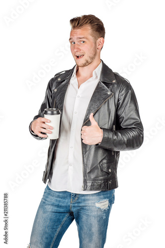 portrait of young man in black eather jacket isolated on a white background. Emotion and people concept. photo