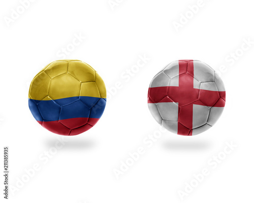 football balls with national flags of colombia and england.