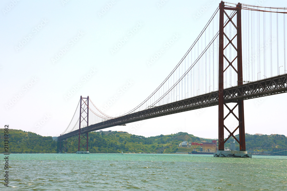 Naklejka premium Ponte 25 de Abril is a suspension bridge in Lisbon, Portugal