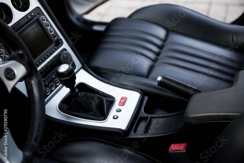 Luxury sport car interior. Car leather seats with gear box © Djordje