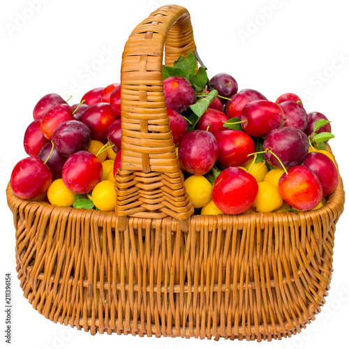 Fototapeta Naklejka Na Ścianę i Meble -  Basket with cherry plum and plums.