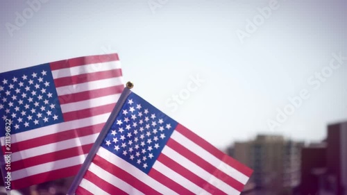 USA national hand flag waving . Great for any patriotic and american national holiday like 4ht of July, Flag day, national day or memorial day. Slow motion from 120 fps original clip photo