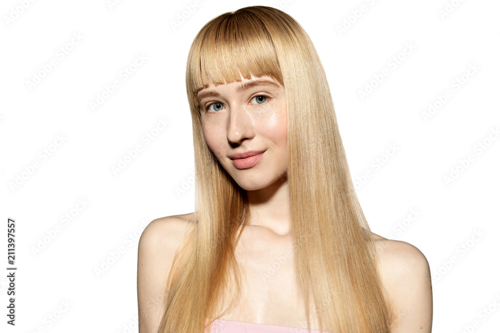 Waist up portrait of lovely young woman with beautiful blue eyes and perfect clean skin. Engaging blonde with sensual smile looking at camera with happiness and calmness Waist up portrait of lovely young woman with beautiful blue eyes and perfect clean skin. Engaging blonde with sensual smile looking at camera with happiness and calmness