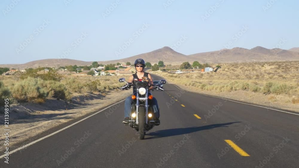 Woman on motorcyle with dog Woman on motorcyle with dog
