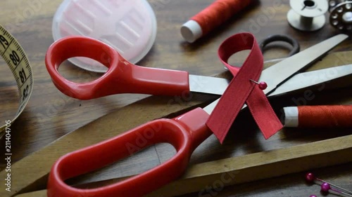 Giornata mondiale contro l'AIDS Día Mundial de la Lucha contra el Sida Journée mondiale de lutte contre le sida Video World AIDS Day Światowy Dzień Welt-AIDS-Tag 世界艾滋病日 يوم الإيدز العالمي Ribbon red photo