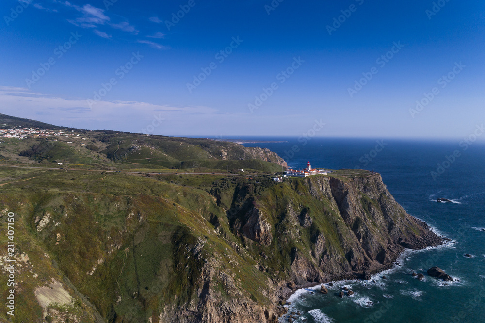 Aerial view of the beautiful Roca Cape (Cabo da Roca) near Sintra, Portugal; Concept for travel in Portugal and best travel destinations.
