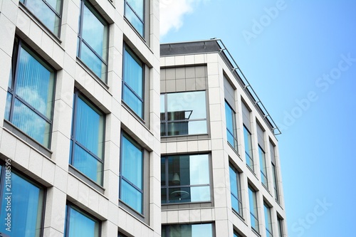 Urban abstract background, detail of modern glass facade, office business building. © Grand Warszawski