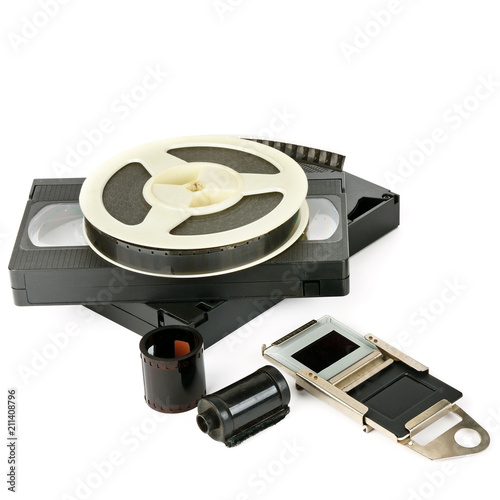 Video cassettes, film and slides isolated on white background.