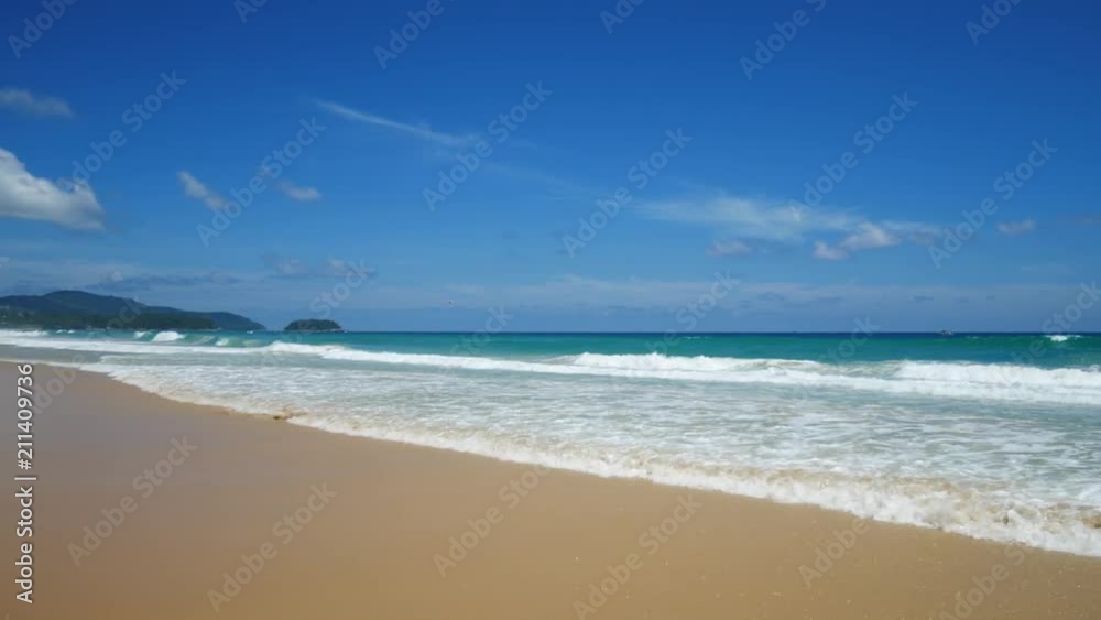 View of beach blue sea and blue sky View of beach blue sea and blue sky