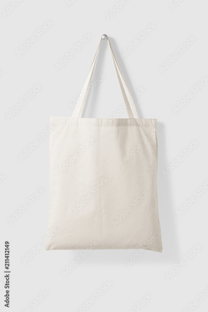 Blank Tote Canvas Bag Mockup hanging on a wall. High resolution. Stock  Photo