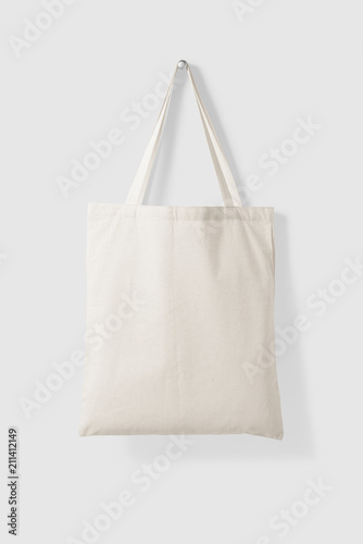 Blank Tote Canvas Bag Mockup hanging on a wall. High resolution. 