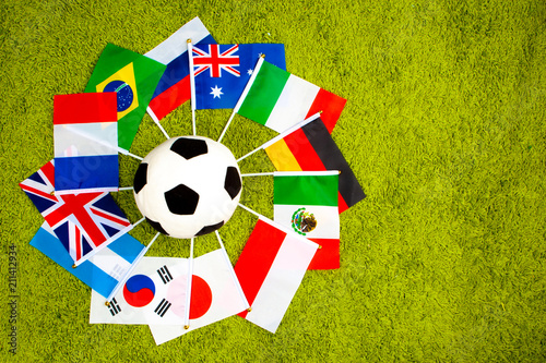 A soccer ball is surrounded...