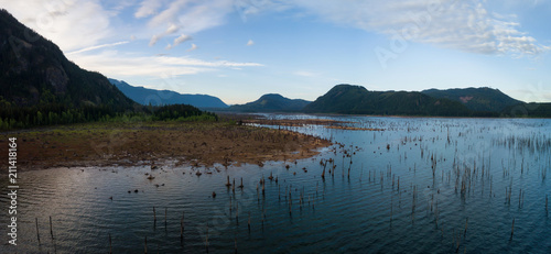 Aerial drone landscape view of the beautiful Canadian Nature during a vibrant morning. Taken in Stave Lake, East of Vancouver, BC, Canada. photo