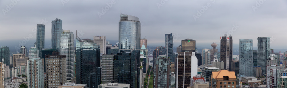Downtown Vancouver, British Columbia, Canada - May 17, 2018: Aerial view of the modern city skyline during a rainy and cloudy day.