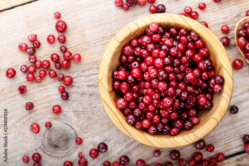 cranberries on a wooden background cranberries on a wooden background