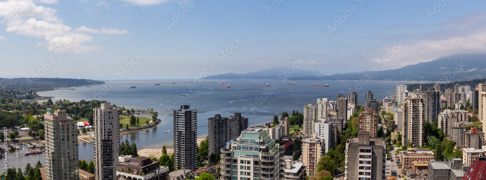 Fototapeta premium Beautiful aerial panoramic cityscape view during a vibrant sunny day. Taken in Downtown Vancouver, British Columbia, Canada.