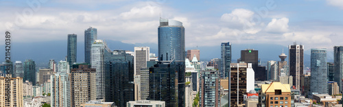Downtown Vancouver, British Columbia, Canada - May 16, 2018: Aerial view of the modern city skyline during a sunny day.