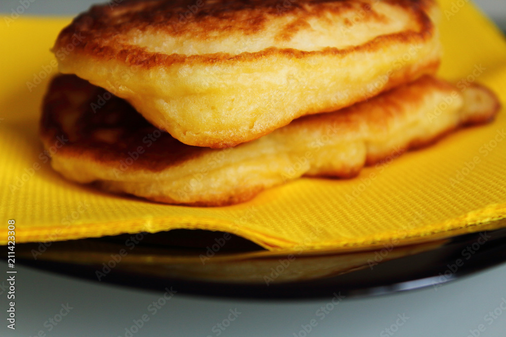 Fresh tasty muffins on a plate. Close-up. Background. Fresh tasty muffins on a plate. Close-up. Background.