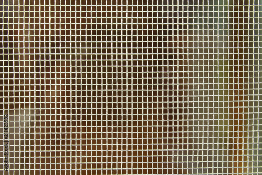 Mosquito net on the window. Close-up. Background. Texture. Mosquito net on the window. Close-up. Background. Texture.