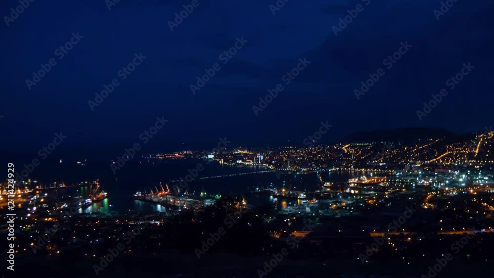 4k Timelapse Top View of Novorossiysk Cityscape day white clouds. night coming. 4k Timelapse Top View of Novorossiysk Cityscape day white clouds. night coming.