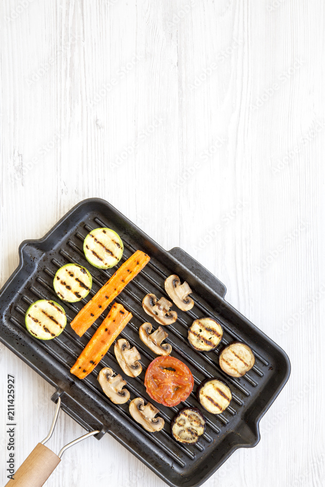 Grilled vegetables in a grilling pan, top view. From above, overhead. Copy space.