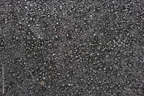 Texture of wet asphalt. © Larysa