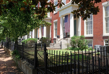 Historic Richmond, Virginia tree shaded brick row houses.