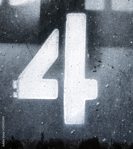 Written Wording in Distressed State Typography Found Number Four 4 photo