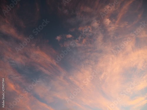 Tokyo,Japan-June 30, 2018: Dramatic sunrise sky with colorful clouds like abstract painting  © Khun Ta
