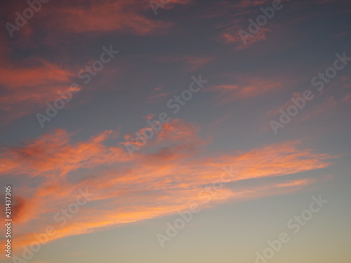 Tokyo,Japan-June 30, 2018: Dramatic sunrise sky with colorful clouds like abstract painting 