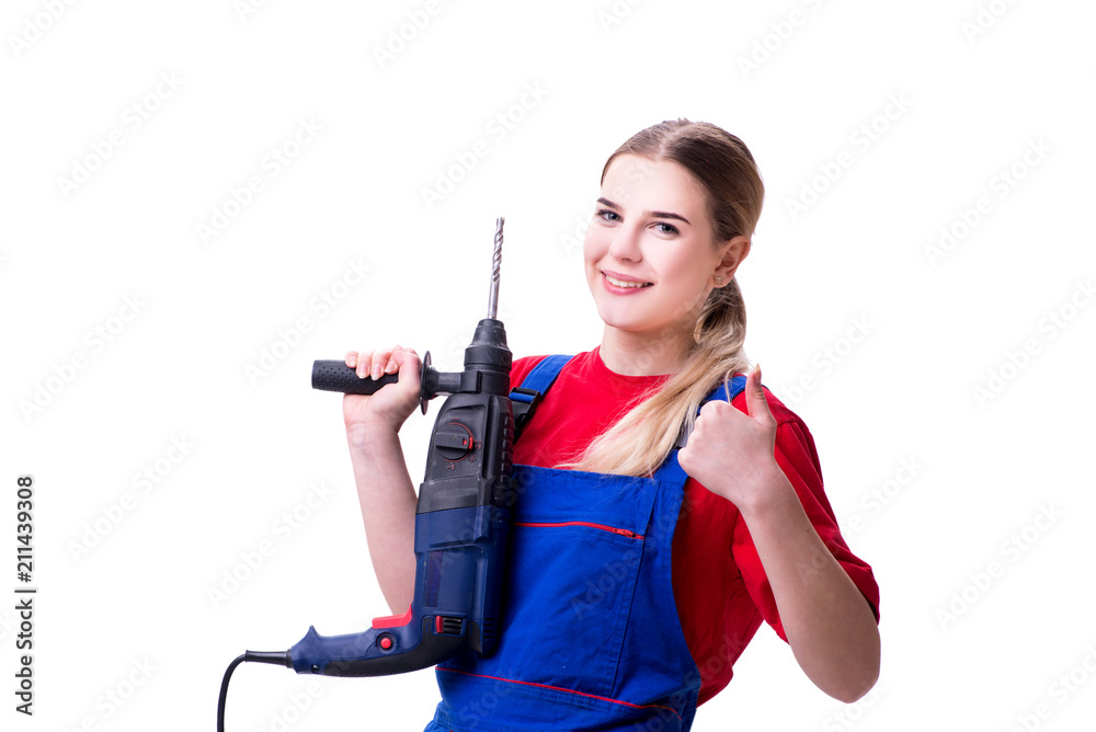 Young woman with power drill isolated on white Young woman with power drill isolated on white