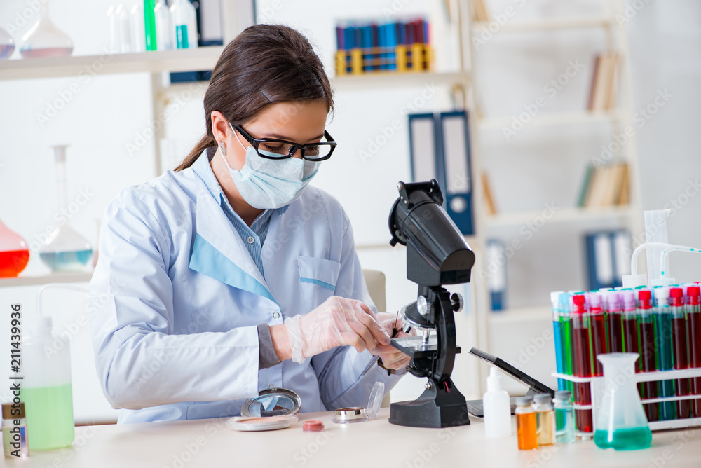 Lab chemist checking beauty and make-up products Lab chemist checking beauty and make-up products