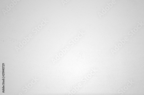 White concrete wall, light center, gray background photo