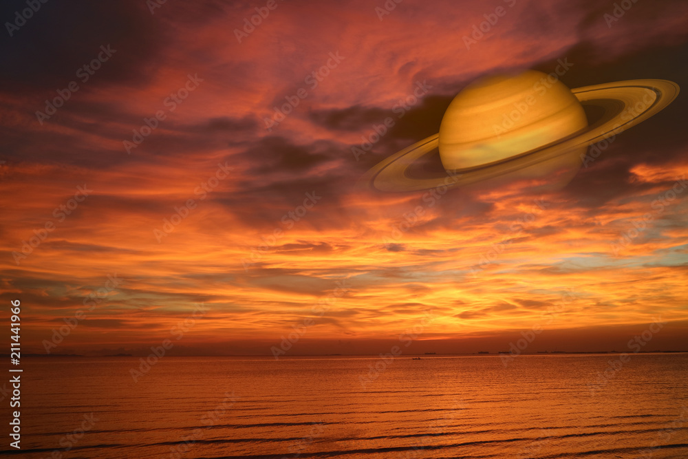 Saturn back night cloud sunset sky on sea ,concept Saturn near Earth