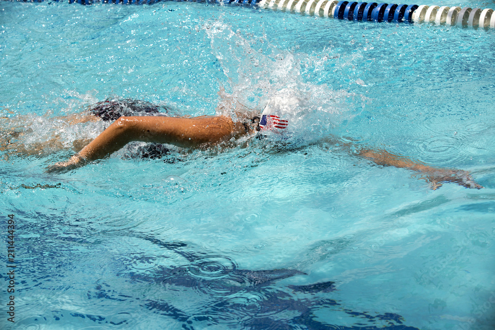 Teen female swimmer at a swim meet
