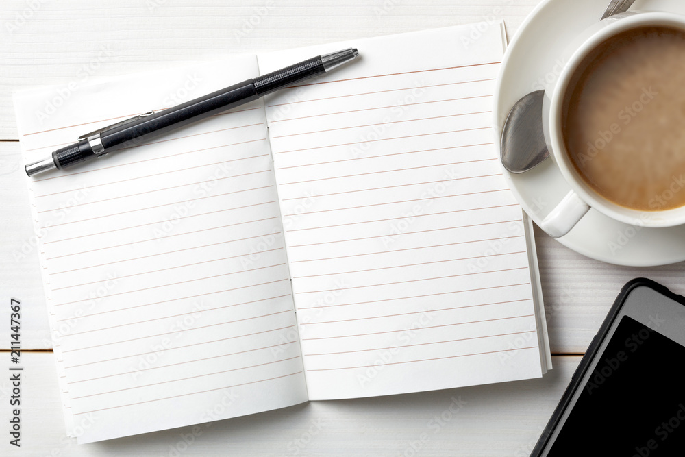 Opened personal organizer with a to do list. on white wooden background. Top view Opened personal organizer with a to do list. on white wooden background. Top view