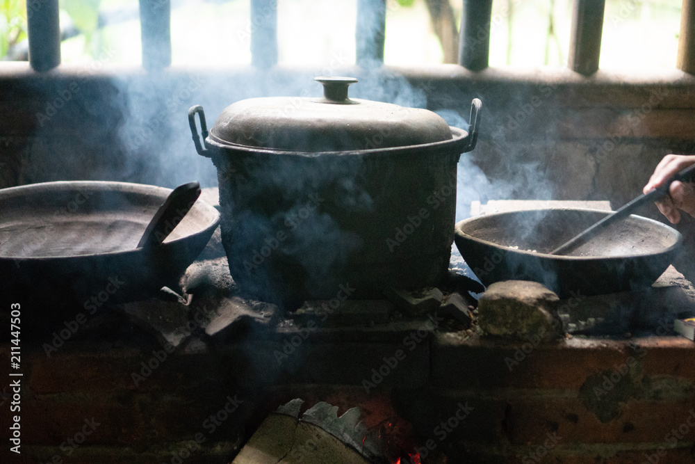 Traditional process of fry coffee beans in Bali, Indonesia Traditional process of fry coffee beans in Bali, Indonesia