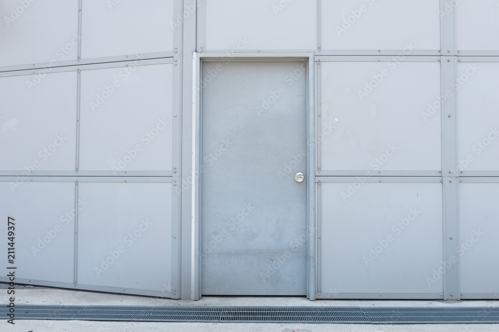 sidewalk by street wall & door sidewalk by street wall & door