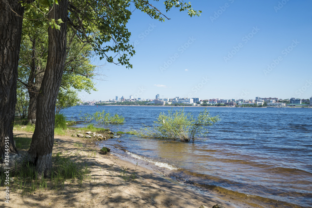 View of the city from the opposite Bank of the Volga river in Samara, Russia. On a Sunny summer day. 28 June 2018