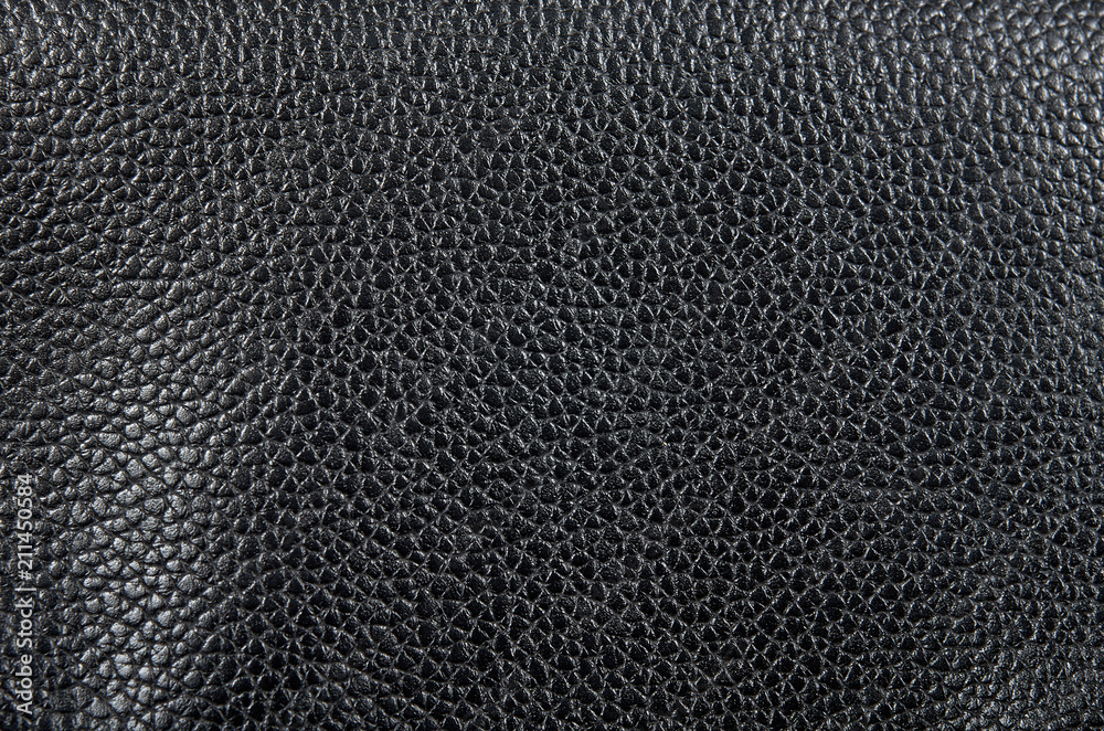 Macro image of black leather texture, material background. Macro image of black leather texture, material background.
