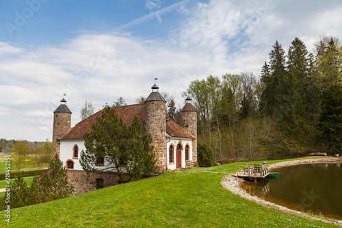 Wine distillery, interesting stone building with big chimneys. Heimtali, Estonia. photo