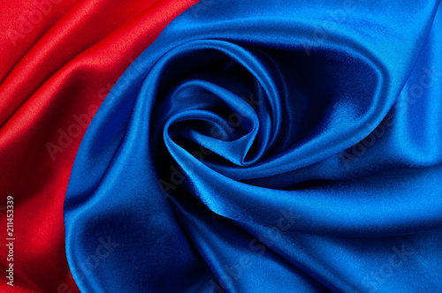 Abstract silk luxury background, piece of cloth, deep red and blue cloth texture
