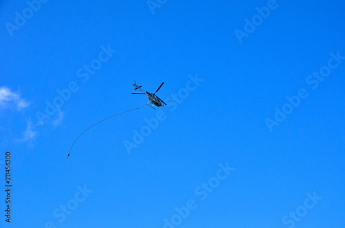 The helicopter which flies away