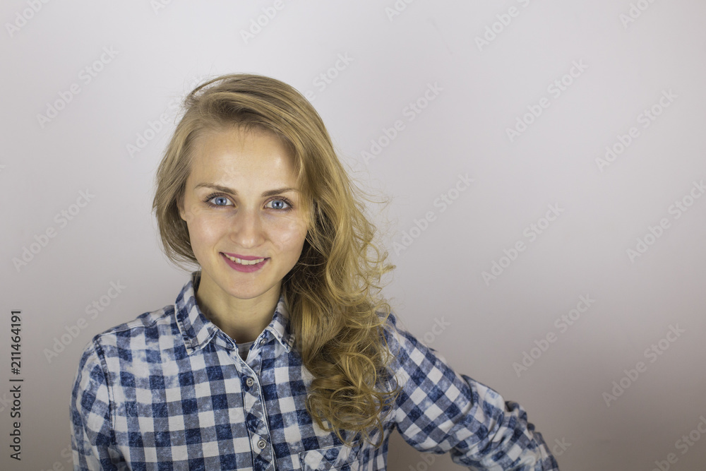 Happy blonde girl smiling looking at camera Happy blonde girl smiling looking at camera