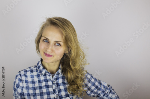 Blonde woman with long hair and happy smile