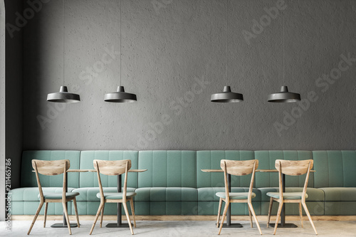 Fototapete Dark gray wall bar interior, green sofas
