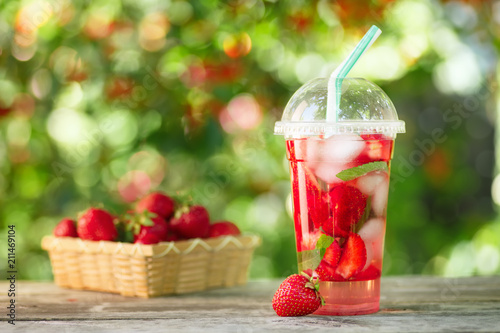 strawberry lemonade in plastic glass